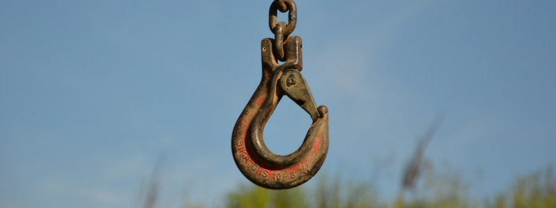 A hook hangs in the sky to represent a behavior change trick
